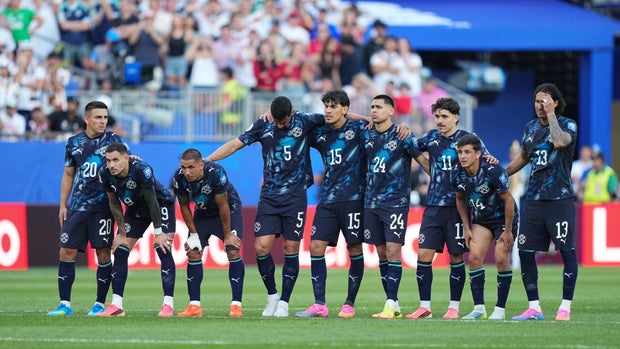 Paraguay players in a World Cup match against Germany 