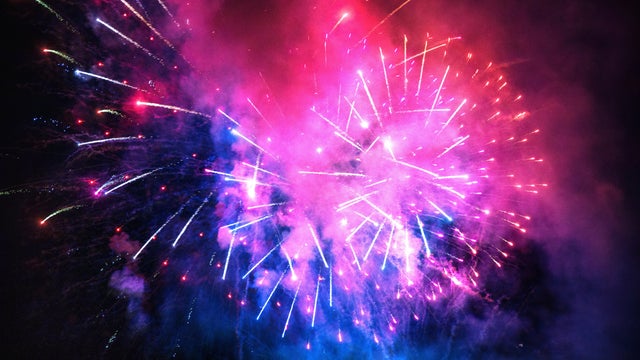 Colorful bright fireworks in the sky during summer festivity in Spain. 