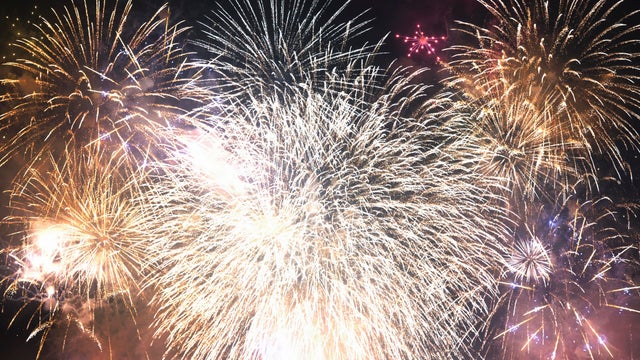 Fireworks in a Night Sky (New Year Celebration Concept) 