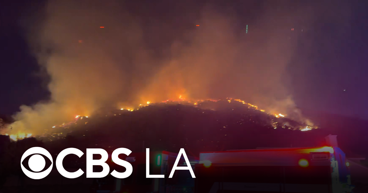 San Bernardino County firefighters battling Beech Fire in Fontana
