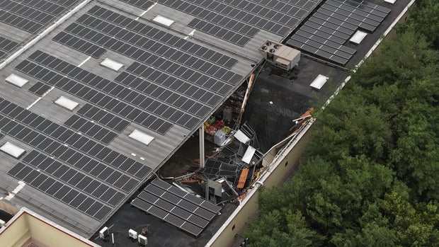 Heavy rain brings store roof collapse and flooding to New Jersey