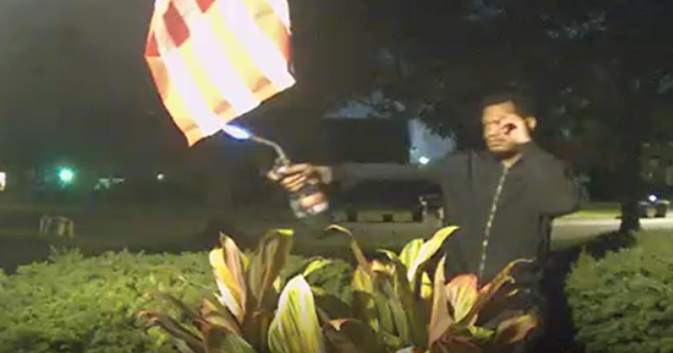 Detroit police searching for suspect who set American flag on fire