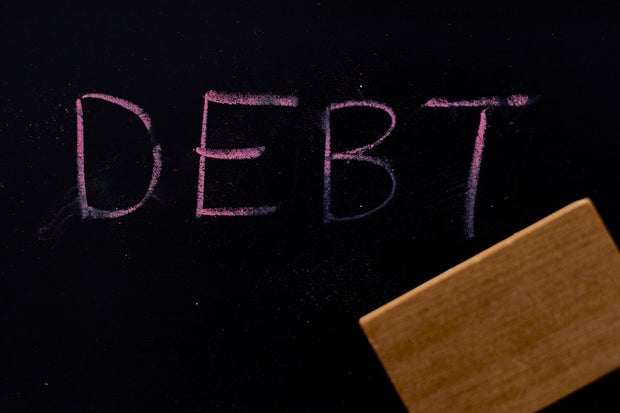 Here's how to get rid of debt 
