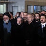 Body of slain Iranian supreme leader arrives in Iraq ahead of funeral procession 