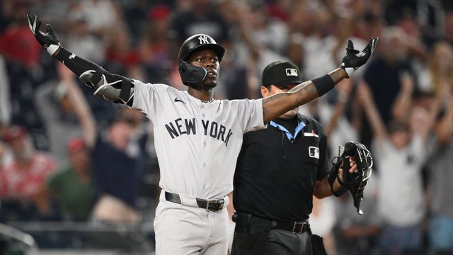 New York Yankees' Jazz Chisholm Jr., front, celebrates after his two-run home run during the ninth inning of a baseball game against the Washington Nationals, Friday, July 10, 2026, in Washington. 