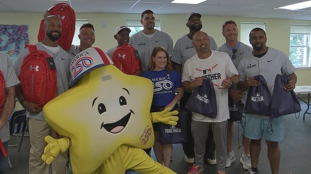 Shane Victorino and others at the Boys and Girls Club volunteer event 