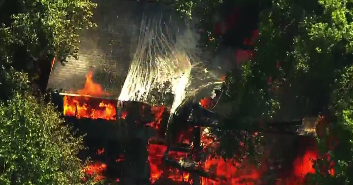 Crews battle Burnsville house fire amid 