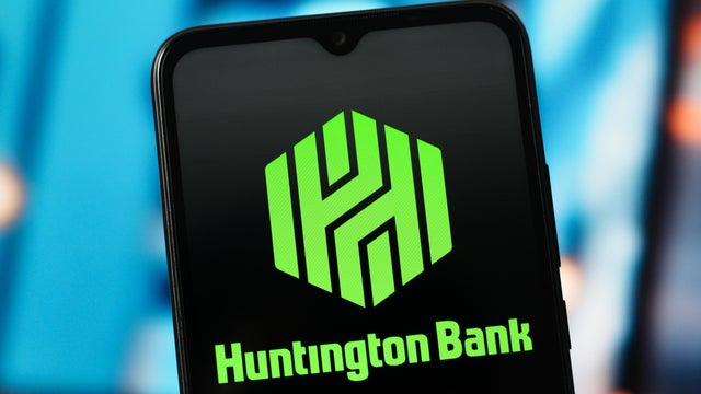 In this photo illustration, the Huntington Bank logo is seen 