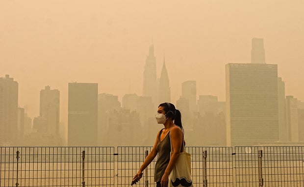 Wildfire smoke from Canada shrouds New York City skyline 