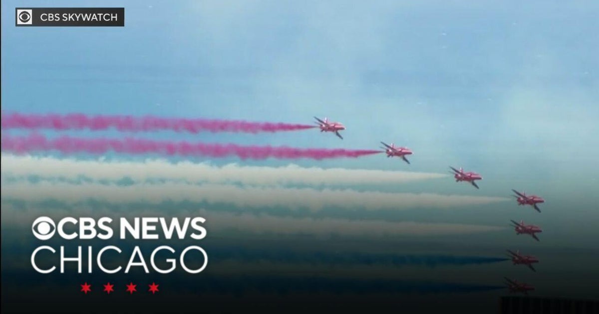 Britain’s Red Arrows aerobatic team fly over Chicago's Loop