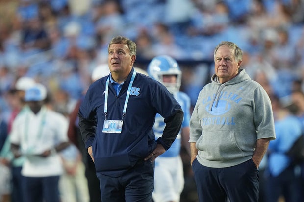 North Carolina head coach Bill Belichick and general manager Michael Lombardi look on from the sideline against TCU at Kenan Memorial Stadium in Chapel Hill, North Carolina, Sept. 1, 2025.