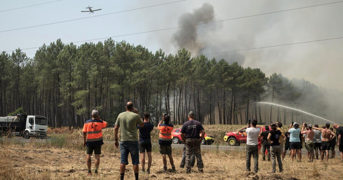 Huge wildfires in Europe force thousands to evacuate as flames grow