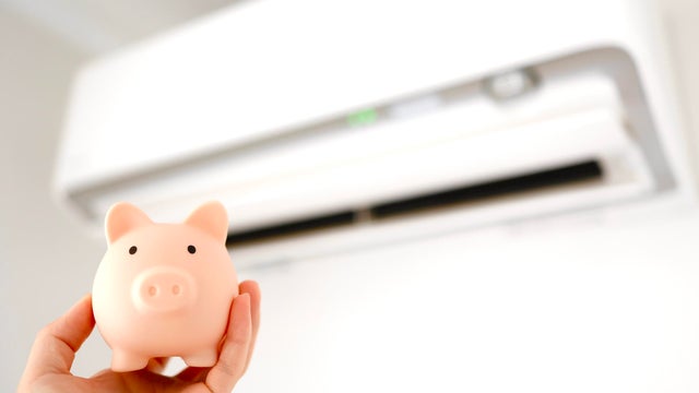 an air conditioner and a piggy bank. 
