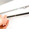 an air conditioner and a piggy bank. 