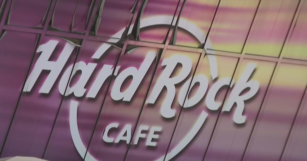 Hard Rock Café bartender says a man attacked her while she worked at the restaurant. Now, she's calling for his arrest.