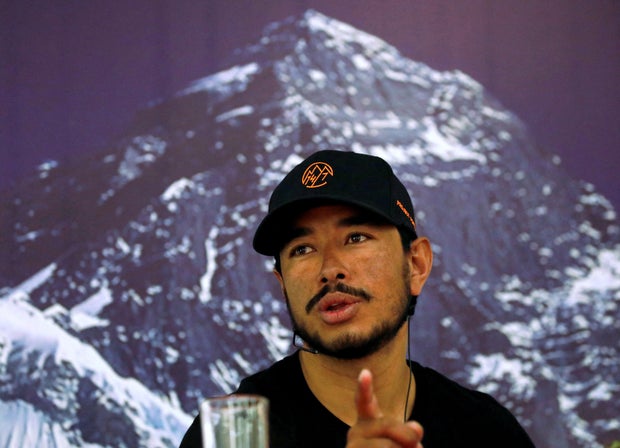 Nirmal Purja, attempting a record to climb fourteen 8000-meter mountain peaks in seven months speaks during a news conference after climbing six mountains including Mt. Everest in Kathmandu