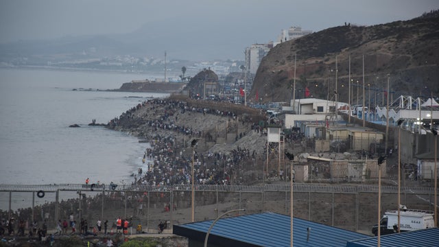 Hundreds Of People Are Swimming Across To Ceuta From Morocco 