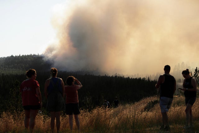 Fast-moving wildfires in Spokane County prompt mass evacuations and destroy hundreds of homes; Mayor Lisa Brown: "worst natural disaster our region has faced"