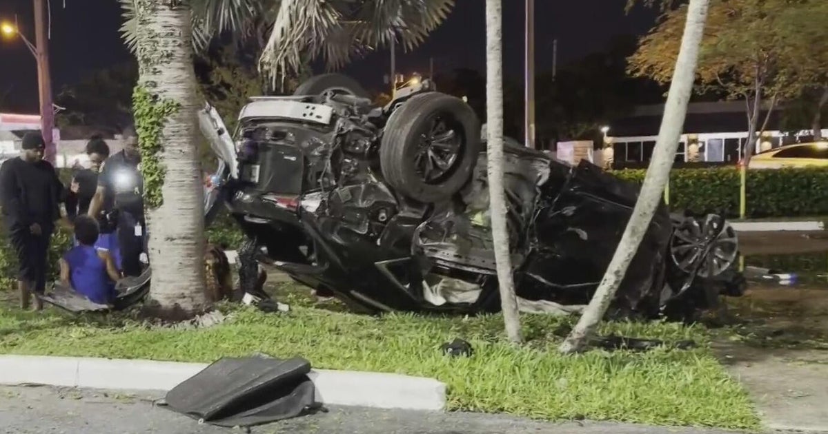 Apparent police chase ends in violent rollover crash at Miami Gardens Tesla dealership