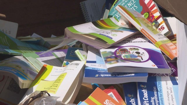 school-supplies-in-dumpster.jpg 