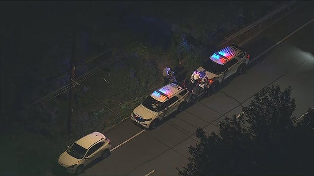 Generic police lights and yellow police tape at crime scene 