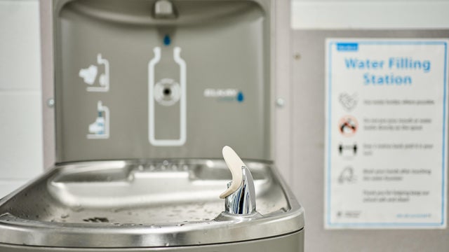 Water fountain and filling station on a wall in a school 