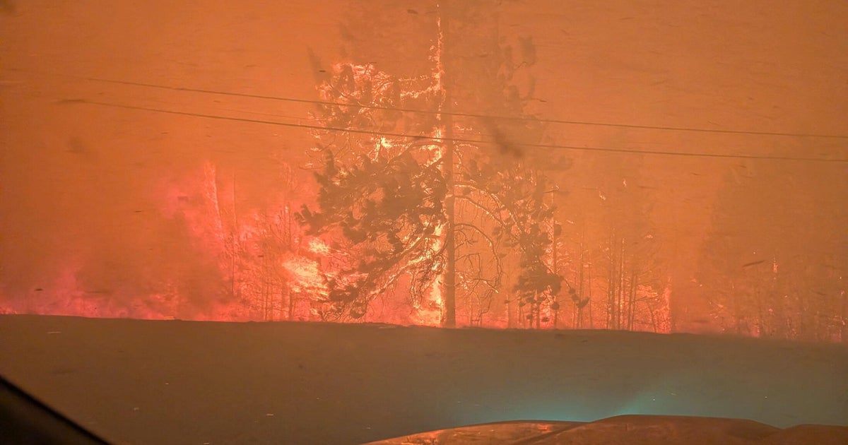 Wildfires in western Canada forces more than 20,000 people to evacuate