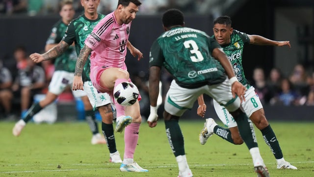 Leo Messi,Juan Dom&iacute;nguez 