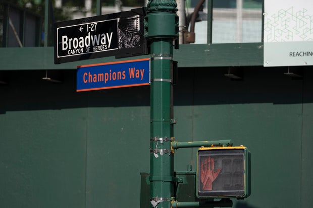A street sign reading "Champions Way" is posted along Broadway known as the "Canyon of Heroes", ahead of the New York Knicks' ticker-tape parade, Wednesday, June 17, 2026, in New York.