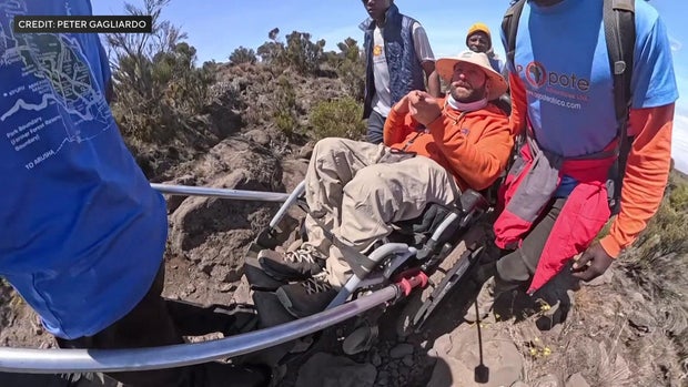 Peter Gagliardo and his team climbing Mount Kilimanjaro