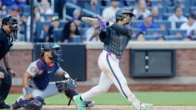 Francisco Lindor #12 of the New York Mets singles in the winning run in the ninth inning of a 5-4 win against the Washington Nationals at Citi Field on August 15, 2026 in New York City. 