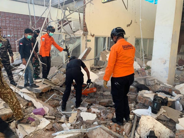 At least 2 dead after 7.7 magnitude quake off Indonesia 
