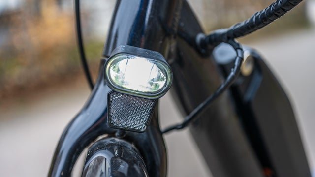 Front bicycle headlight with close detail view.. 