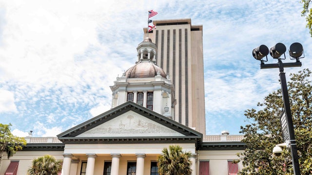 Exterior state capitol building in Florida during day with modern architecture of government 