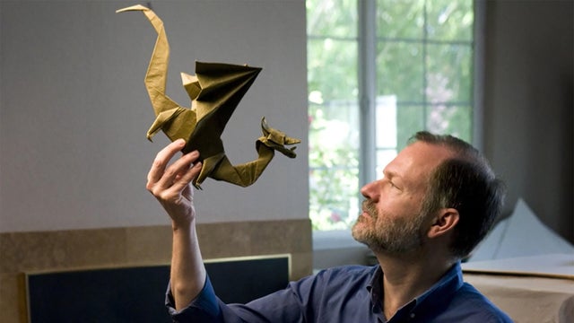 From the ashes arise origami koi - CBS News