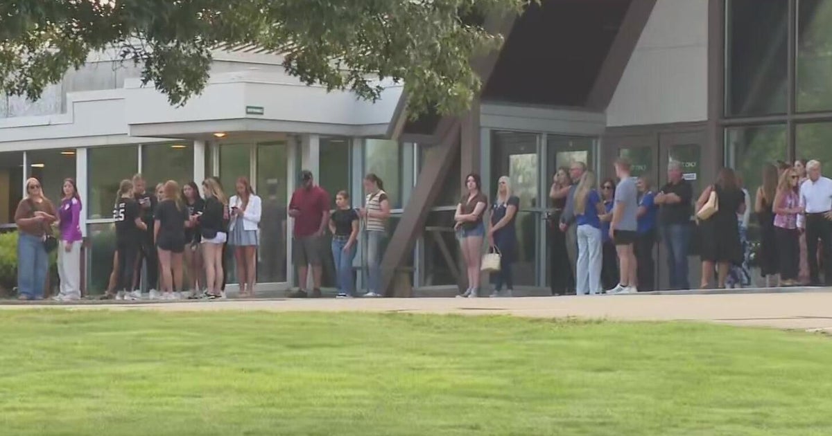 Family, friends gather to remember Karoline Heintz at candlelight vigil