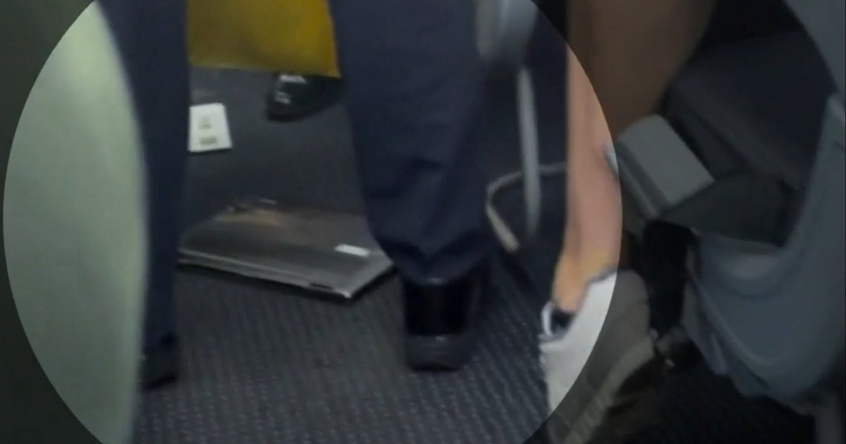 Laptop catches fire on flight to Dallas