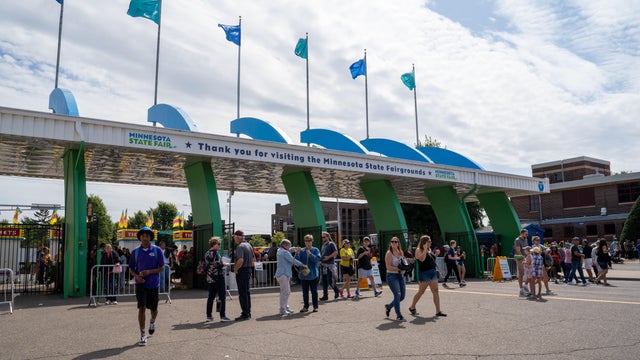 Visitors enter the gates to the Minnesota State Fair, a two-week event held at the end of summer each year 