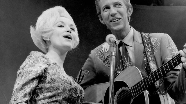 Dolly Parton and Porter Wagoner perform 