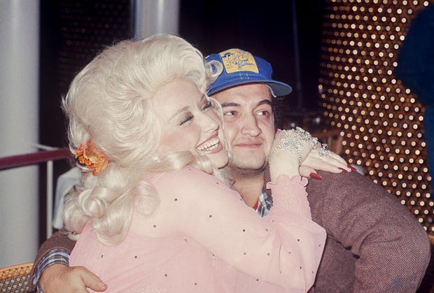 John Belushi and Dolly Parton 