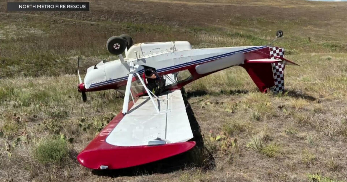 One person hospitalized after plane flips over - CBS Colorado