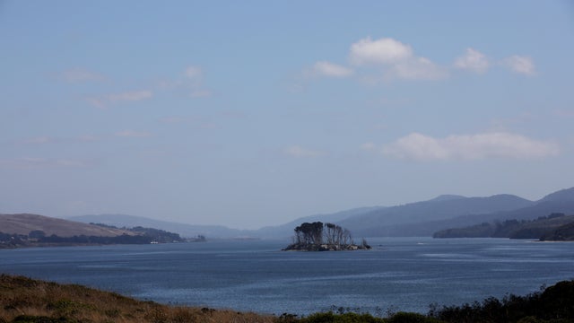 Hog Island is seen from Tom's Point in Tomales Bay, Calif., on Thursday, August 29, 2019.   The Coast Miwok and Southern Pomo Indians of Marin County were not exterminated by Spanish and American colonists. They not only survived colonization, but they pr 
