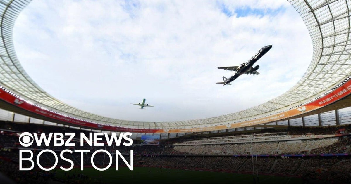 Two passenger jets make jaw-dropping low flyover at South Africa stadium