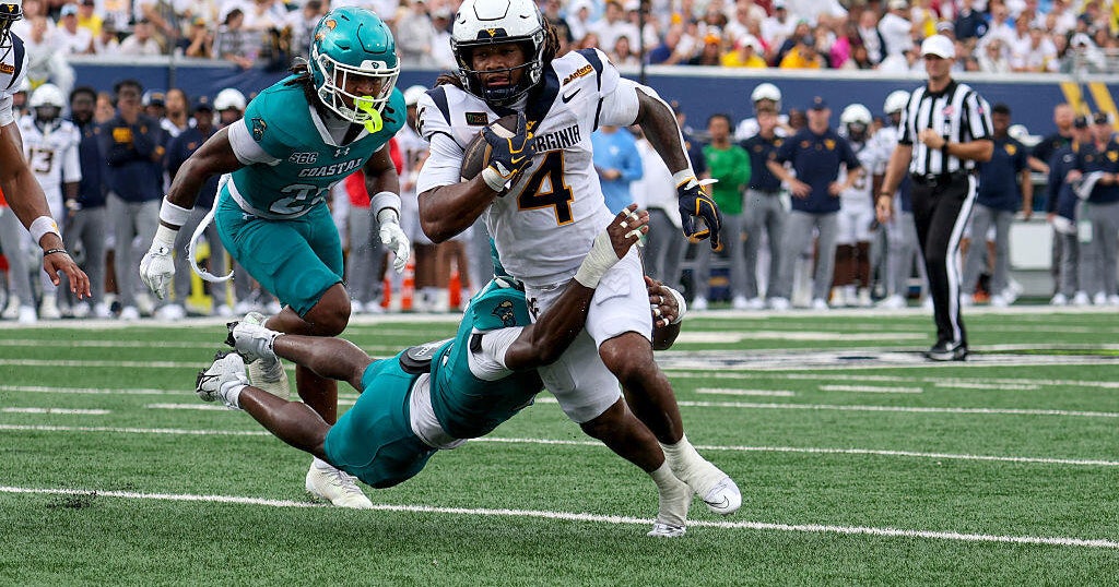Cook, Hawkins lead West Virginia over Coastal Carolina 31-24