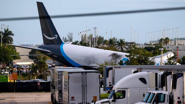 cbsn-fusion-amazon-cargo-plane-overshoots-runway-in-miami-in-deadly-crash-thumbnail.jpg