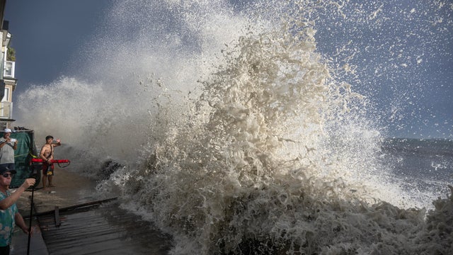 Dangerous surf, flooding seen as rain related to Hurricane Marie pelts Southern California 