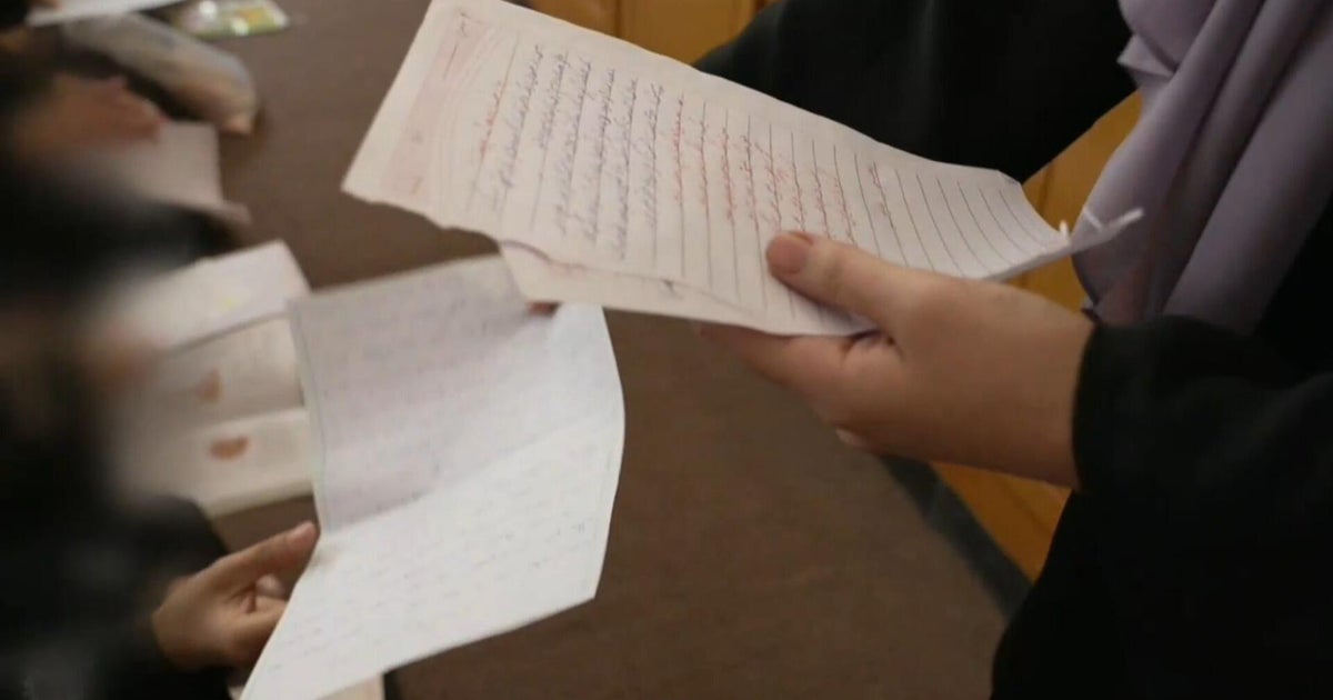 Under Taliban control, Afghan girls write "letters to the world" from their secret school