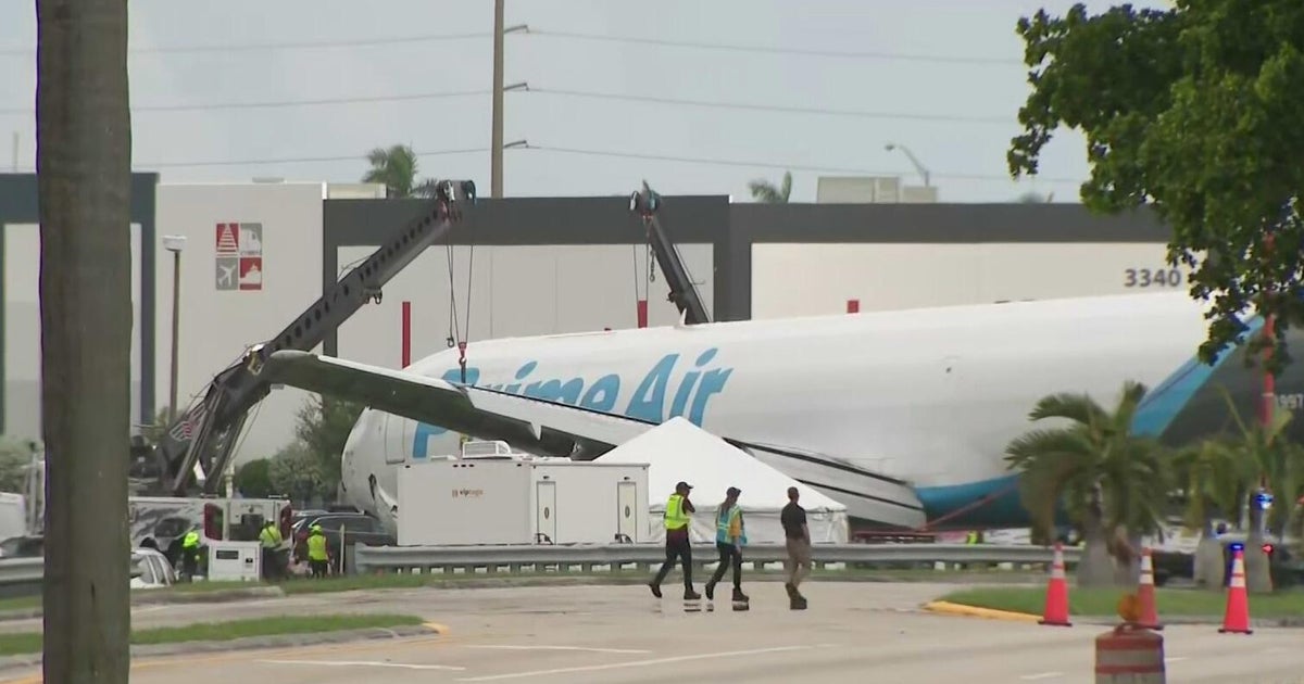 Crews begin to disassemble crashed Amazon cargo plane at Miami International Airport