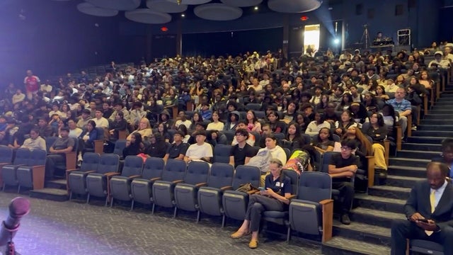 Students in an auditorium 