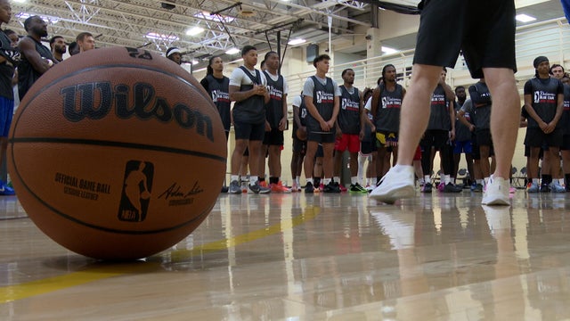 Players line up during open tryouts for the Delaware Blue Coats at Rowan University 